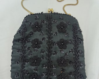 Items similar to Vintage clutch handbag Black Raffia and acrylic ...