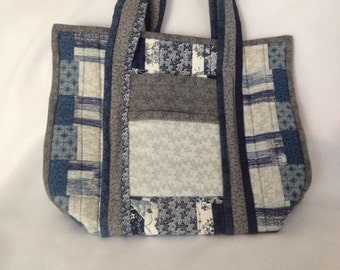 gray quilted bag