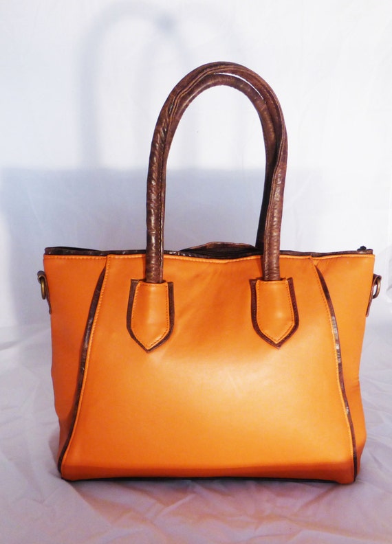 orange leather handbags and purses