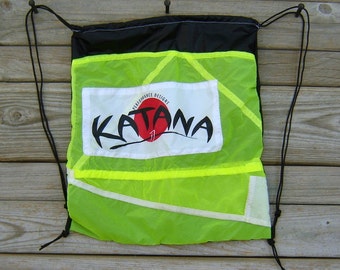 Black Drawstring Backpack with Neon Yellow Katana Parachute End Panel Applique