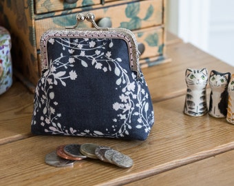 Coin purse made with Nani Iro, Joy Flower and an interior of Essex Linen metallic, with a hand stitched silver colour metal frame