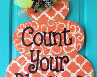 Three-Tiered Pumpkin from Simply aDOORable. Wood Door Hanger, Fall Door Decor, Fall Door Hanger, Halloween Door Decor