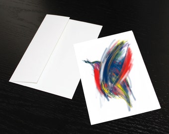 Carte de souhaits "Oiseau rouge, bleu, jaune". Format, une fois plié 5 x 7, intérieur blanc. Enveloppe comprise.