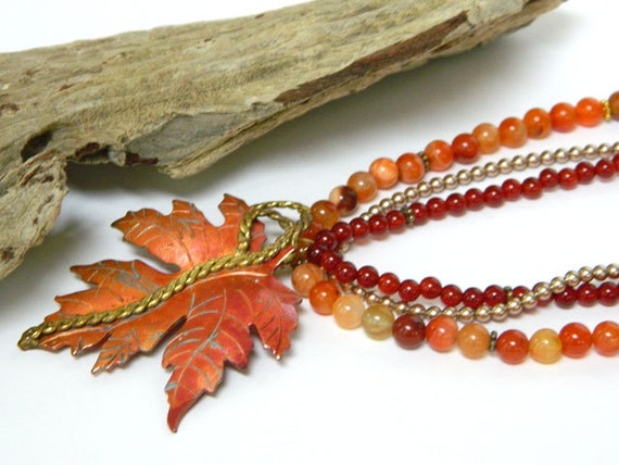 Orange Beaded Necklace with Copper Leaf Pendant by Blonde Peach Jewelry