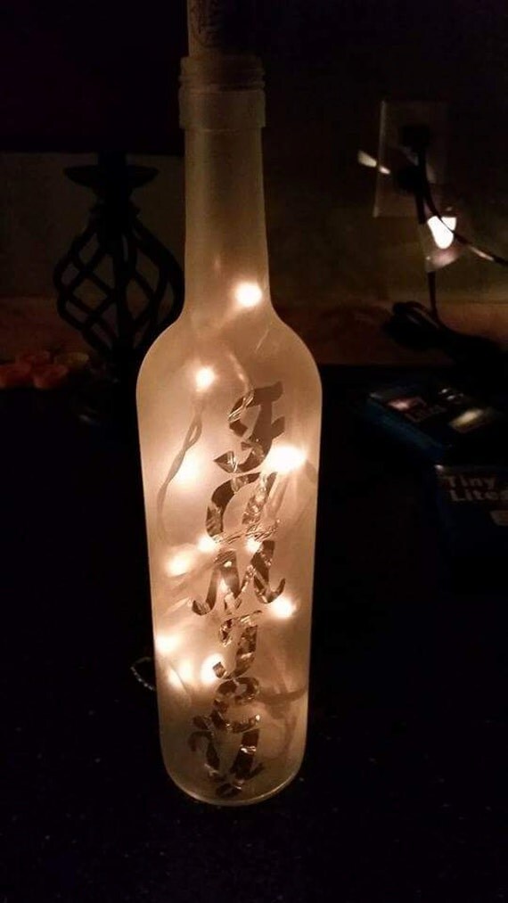 Items similar to Family Frosted and lighted Wine Bottles on Etsy