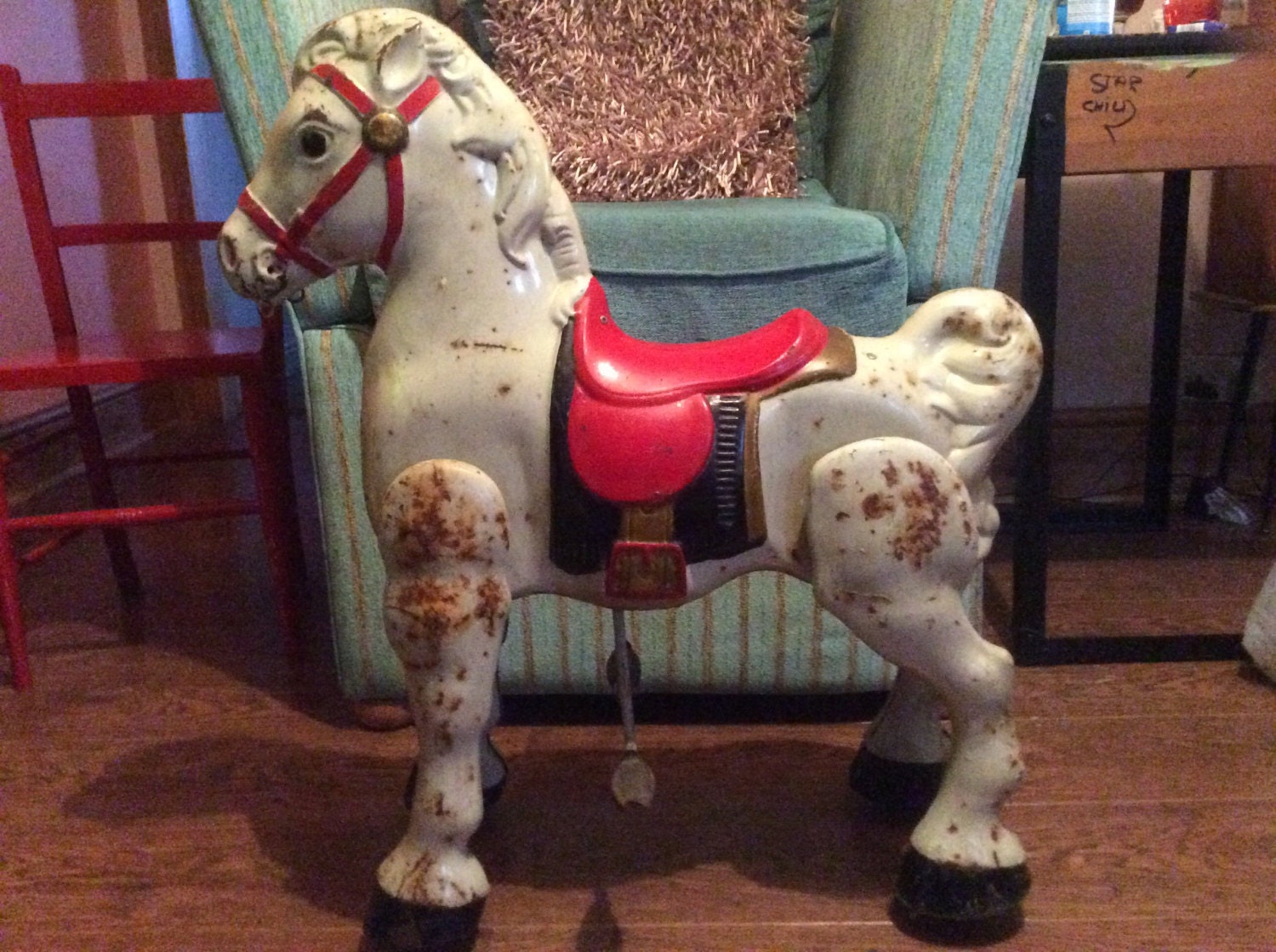 sit on moving horse toy