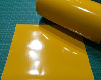 12 inch x 10 foot roll of Canary Yellow Permanet Adhesive Vinyl .