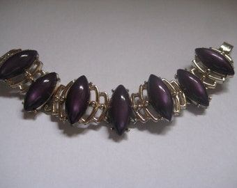 Gold Tone Panel Bracelet with Purple Poured Plastic Cabochons
