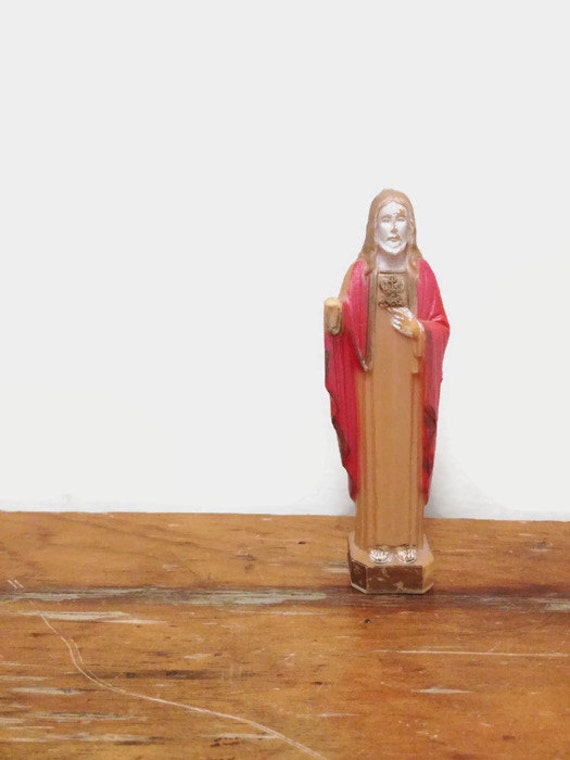 small plastic jesus figurines