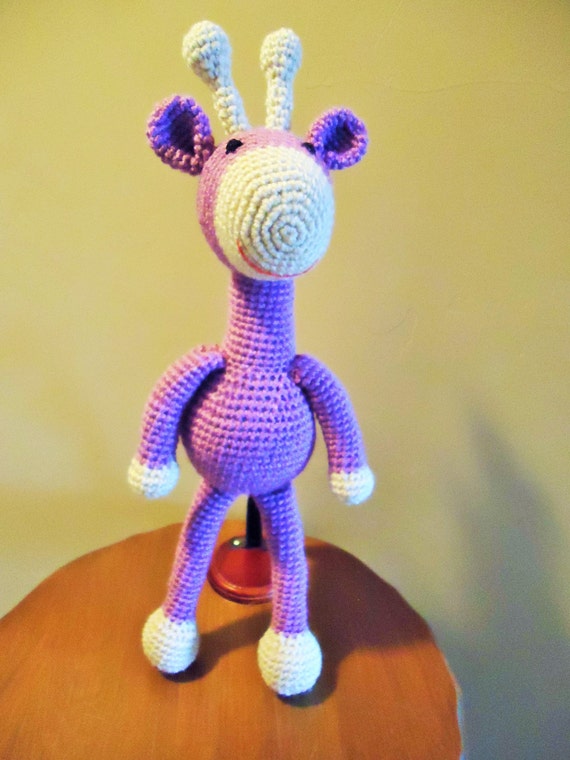 purple stuffed animal giraffe