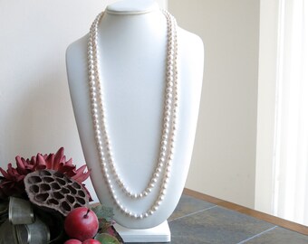 Knotted white freshwater pearl necklace