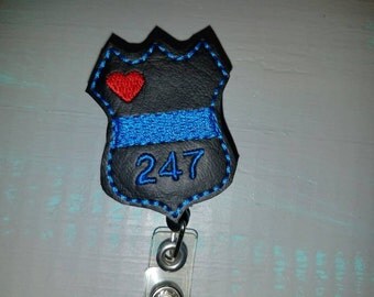 Police support blue line personalized retractable badge holder reel. Add your officers badge number