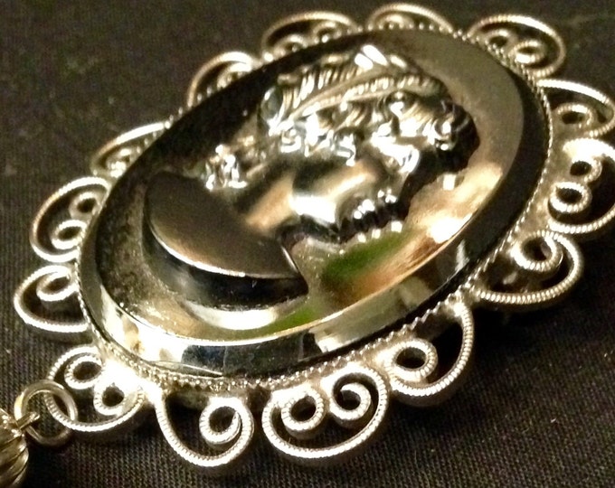 Storewide 25% Off SALE Vintage Silver Tone Designer Cameo Brooch Pendant With Matching Tassel Featuring Mirrored Lace Trim Design