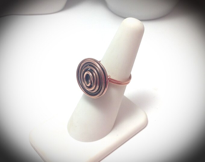 Antiqued copper wire wrapped ring with large swirl focal