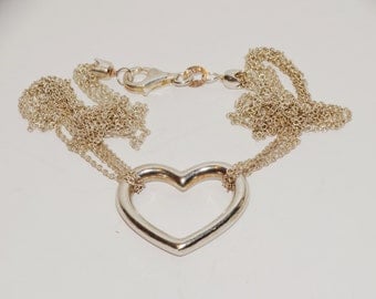 Sterling Silver Four Chain 16" Long Heart Necklace.