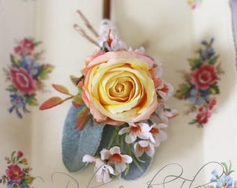 Chris - Men's Buttonhole / Boutonniere - vintage, country Garden style buttonhole, orange / peach rose, Geraldton wax and grey foliage.