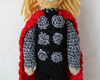 chris hemsworth doll