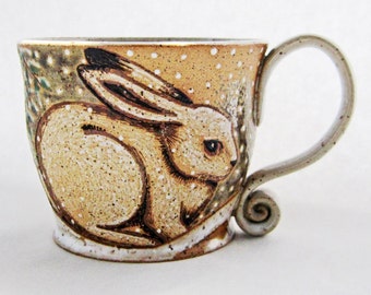 Winter Rabbit Mug, great gift idea, pottery mug, rabbit mug, winter scene mug, holds 14 oz and is dishwasher and microwave safe.