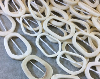 White/Ivory Vertebrae Bone Slice Open Freeform Oval Beads - 20-30mm x 40-50mm Approx.- Sold by 16" Strand (Approx. 10-11 Beads Per Strand)