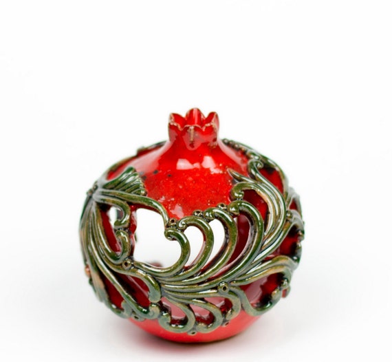 Ceramic pomegranate with ornaments 