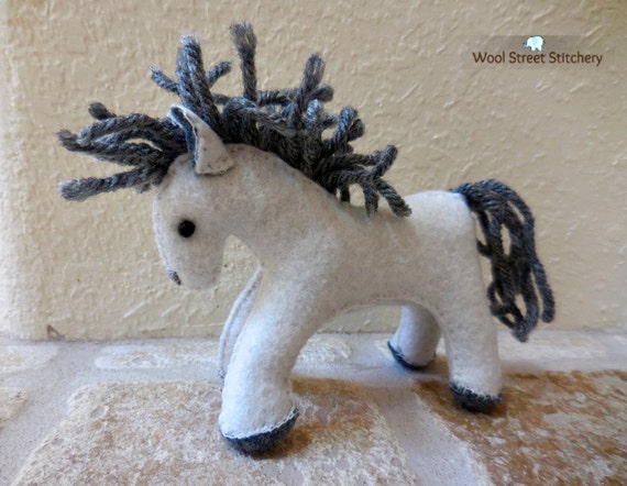 white pony soft toy