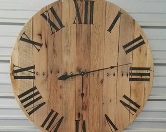 50" Reclaimed wood farmhouse fixer upper style wall clock with natural finish and black roman numerals.