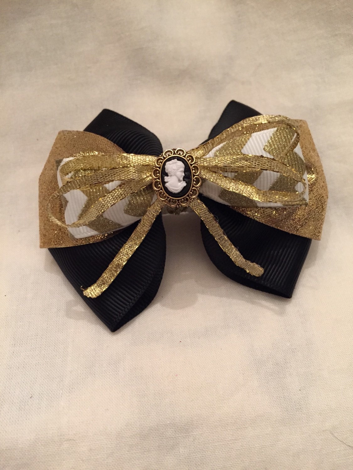 Black and Gold Cameo Brooch Hair Bow by CheekyMonkeyRibbons
