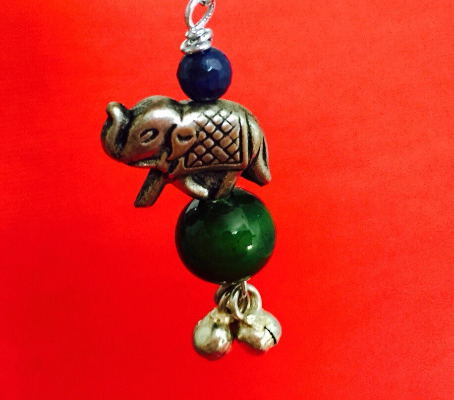 Exotic Indian elephant lambada with good luck charms by SkapaSkapa