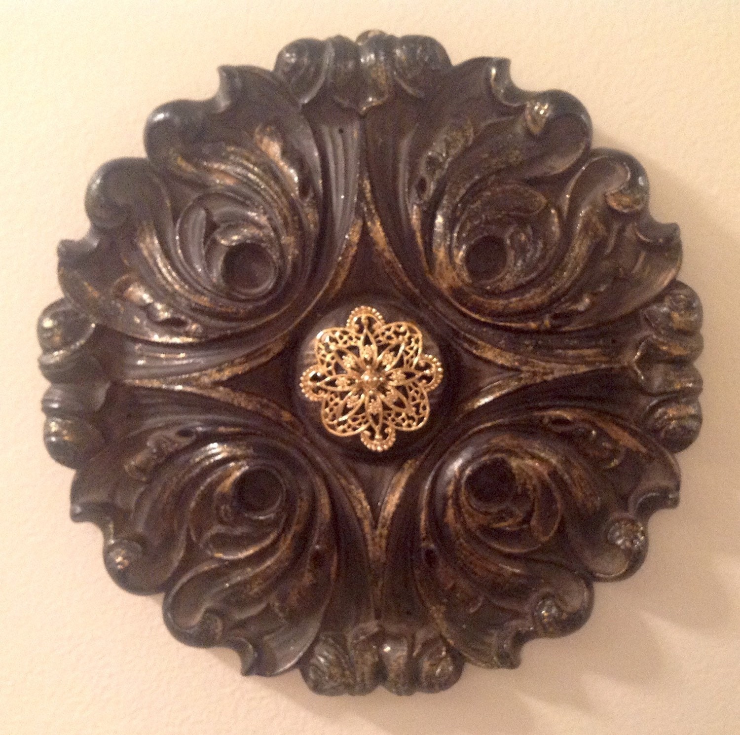 Medallion wall decor plaque black and gold round with gold