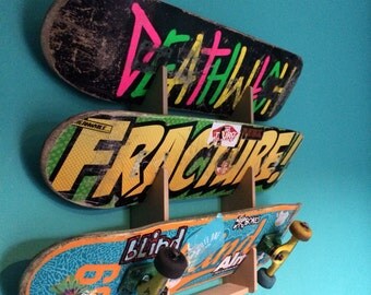 Skateboard rack. Holds up to 3 boards.