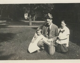 Vintage photo 1917 Father 2 Daughters He Wears the Hair Bow Good Sport