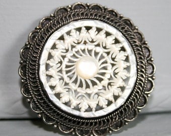 950 Bethlehem Carved Mother of Pearl Brooch