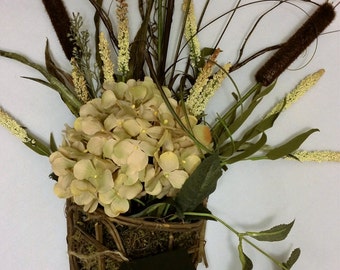 Hydrangea and cattail wall arrangement
