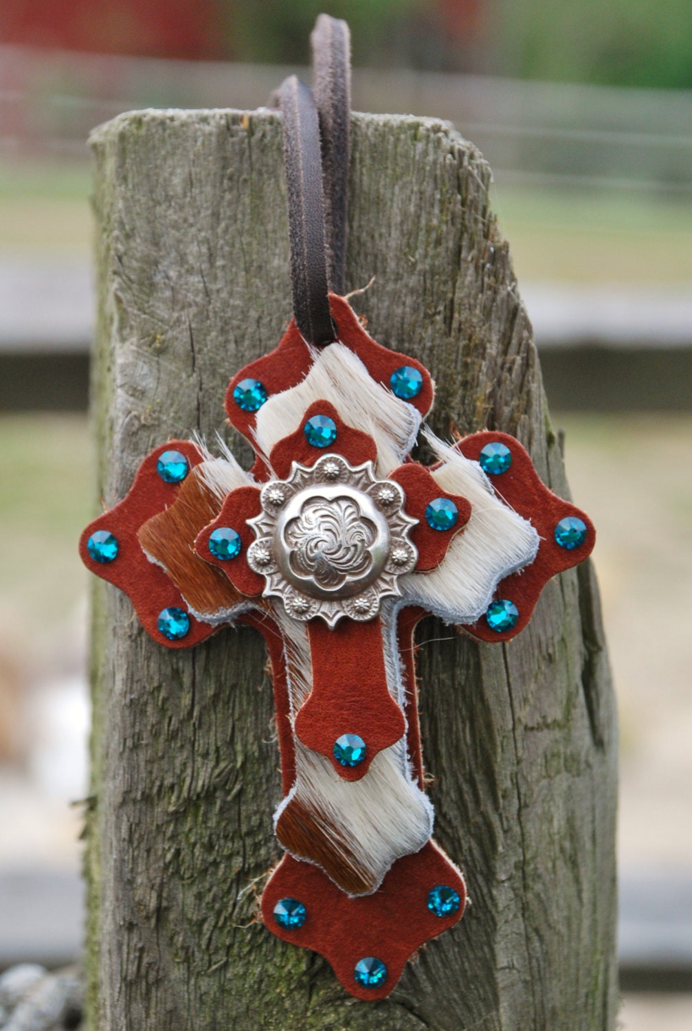 Leather and Cowhide Saddle Tie On Cross with by SolisOccasusBling