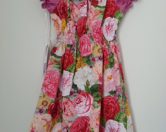 Gorgeous sweet Girls pink floral peasant dress size 5 and 6 available