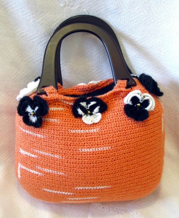 Items similar to Black, White, and Orange crocheted pansy handbag on Etsy