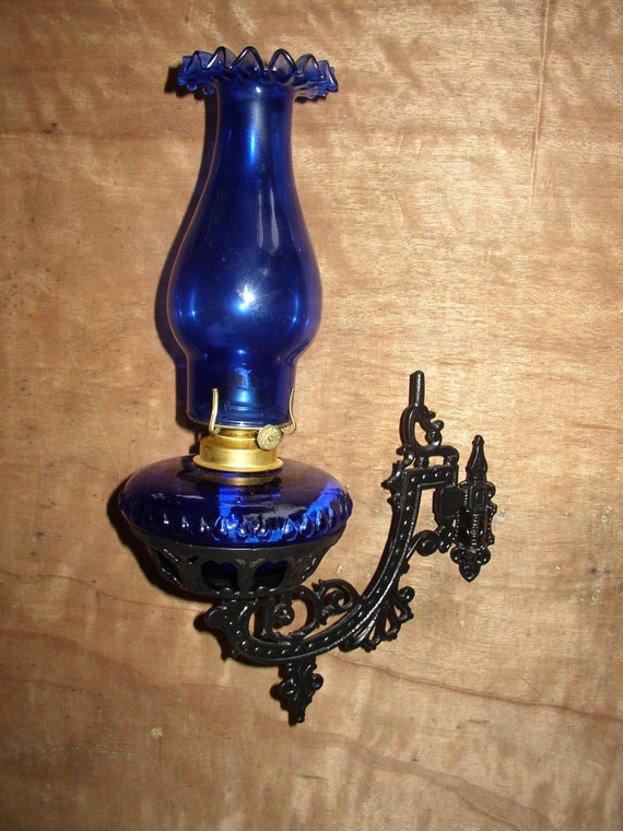 BEAUTIFUL COBALT BLUE Oil Lamp With A Cast Iron Wall Mount