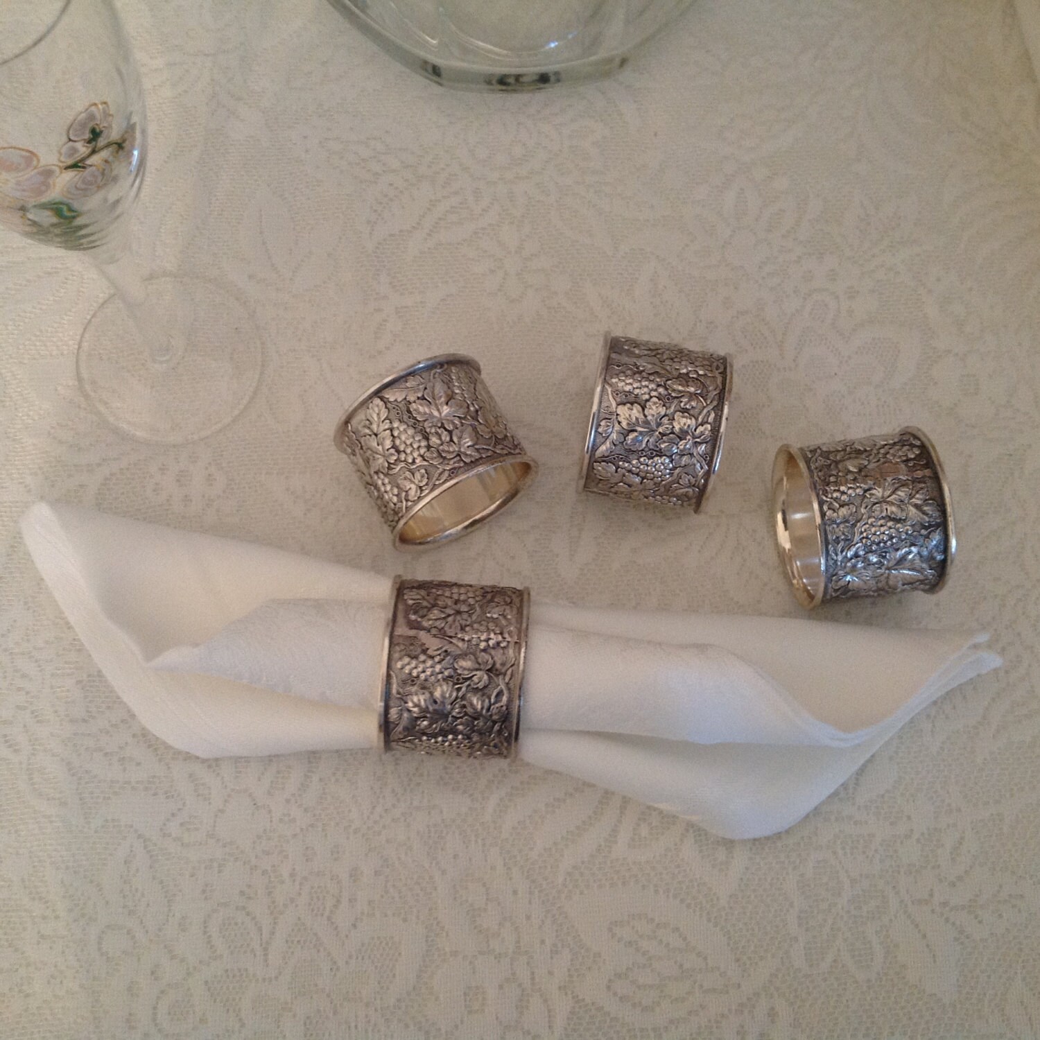 Set of Four Silver Metal Napkin Rings with Grape Vine Design Haute Juice