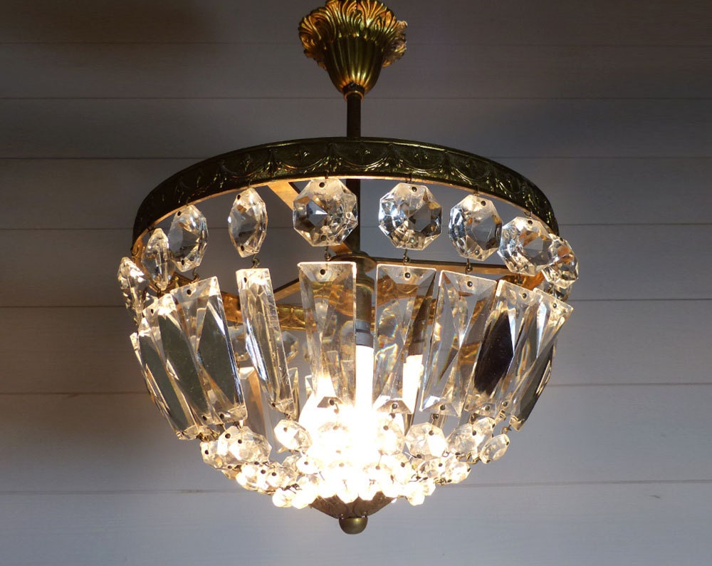 French Antique Crystal Prisms And Brass Chandelier By LaLoupiote