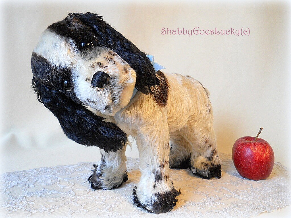 black and white stuffed dog toy