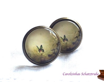 Summer Meadow brown-colored earrings with butterfly