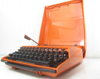 Vintage Smith Corona Typewriter, Manual Typewriter,racing stripe,Made in USA, Orange Color,Designed By Ghia, black stripes