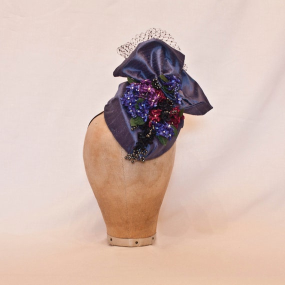 Stunning handmade pure silk deep blue ladies hat decorated with delicate flowers and tulle bow