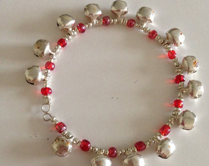 red and silver glass stacking memory wire bracelets with bells