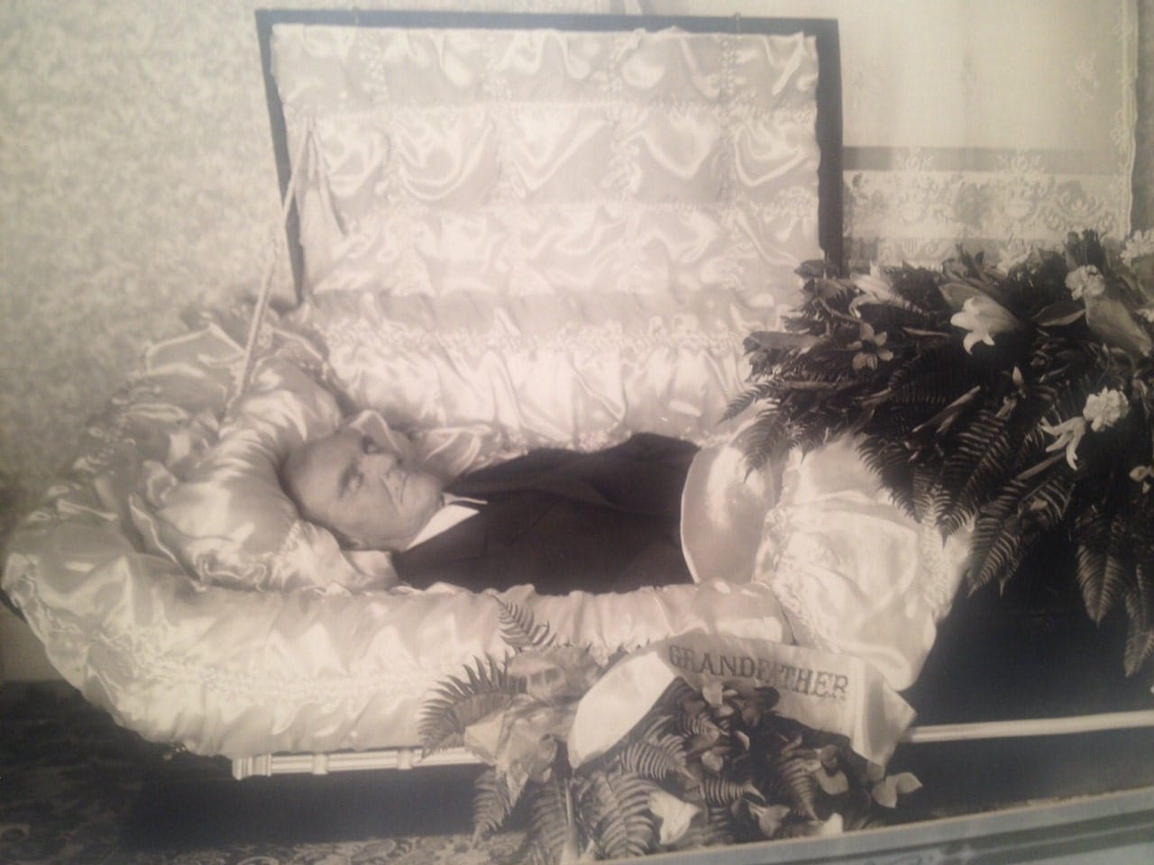 Postmortem photo man in casket c. 1940