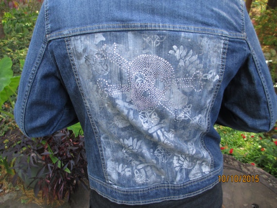 Hand painted denim jacket with rhinestone skull accents women's size large