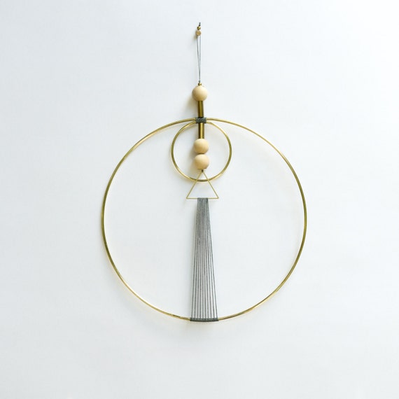 Multi geo wall hanging with grey thread. Handmade. Geometric.