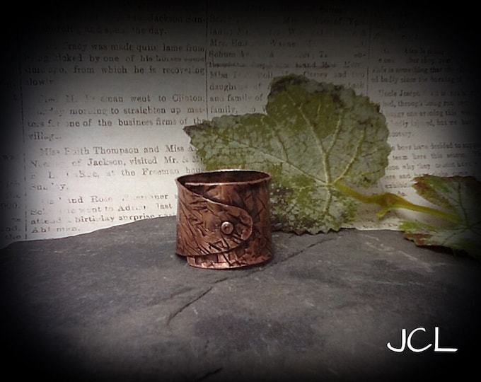 Wrap around copper ring with rivet