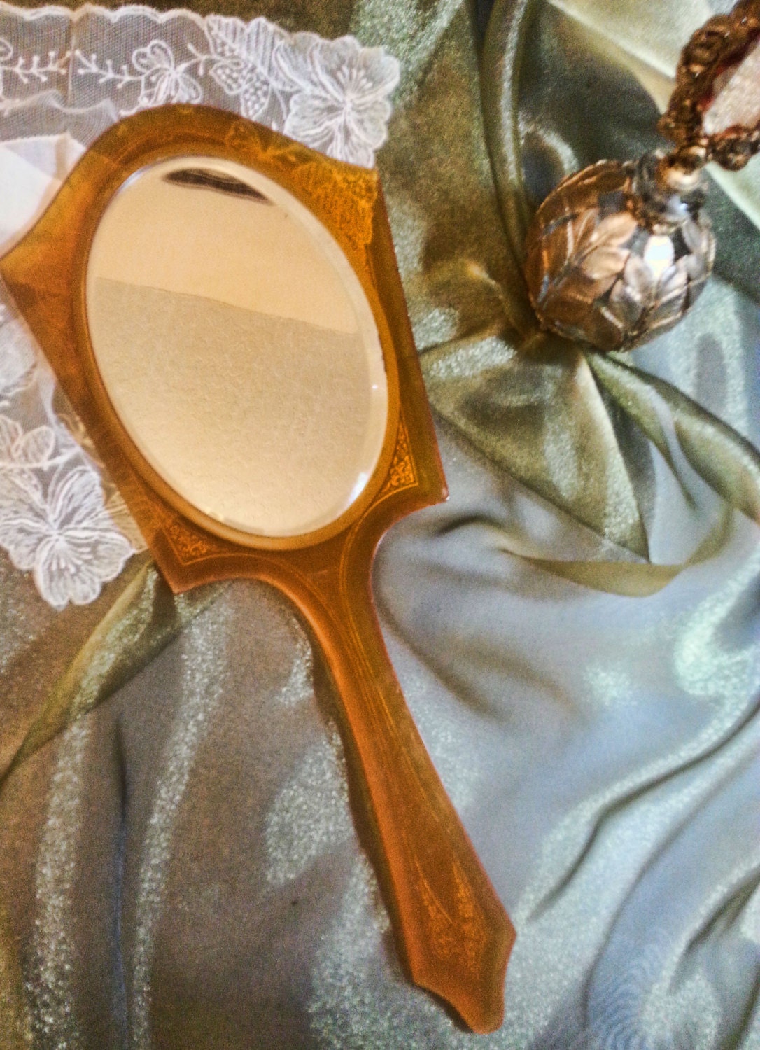 Uniquely shaped Bakelite Vintage Art Deco Hand Mirror