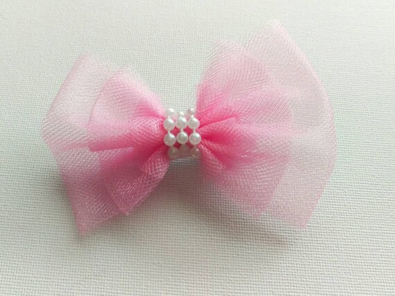 https://www.etsy.com/listing/250965909/hair-bow-pink-tulle-hair-bow-with-center